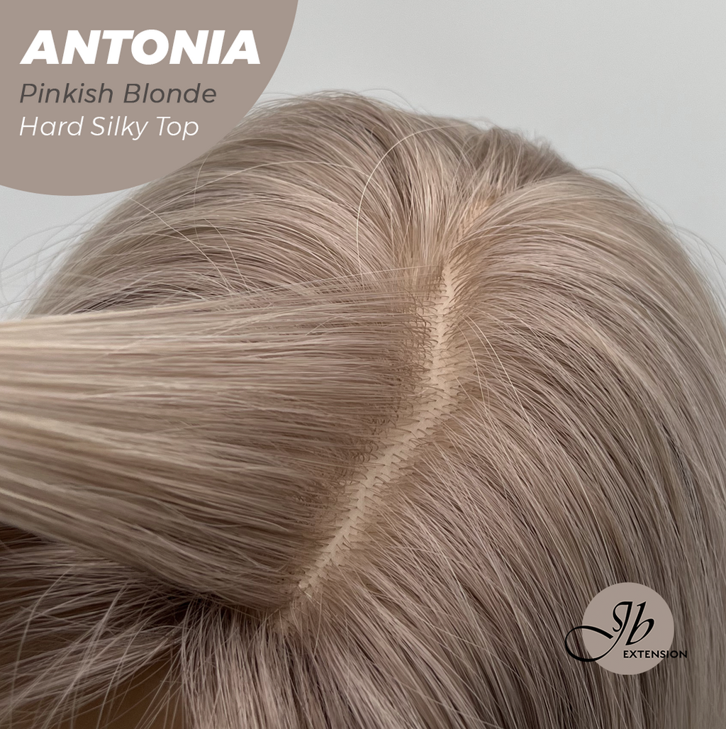 JBEXTENSION 28 Inches Scalpiana Long Curly Pinkish Blonde 3.5X4 Hard Silky Top Natural Scalp Effect Wig ANTONIA PINKISH BLONDE